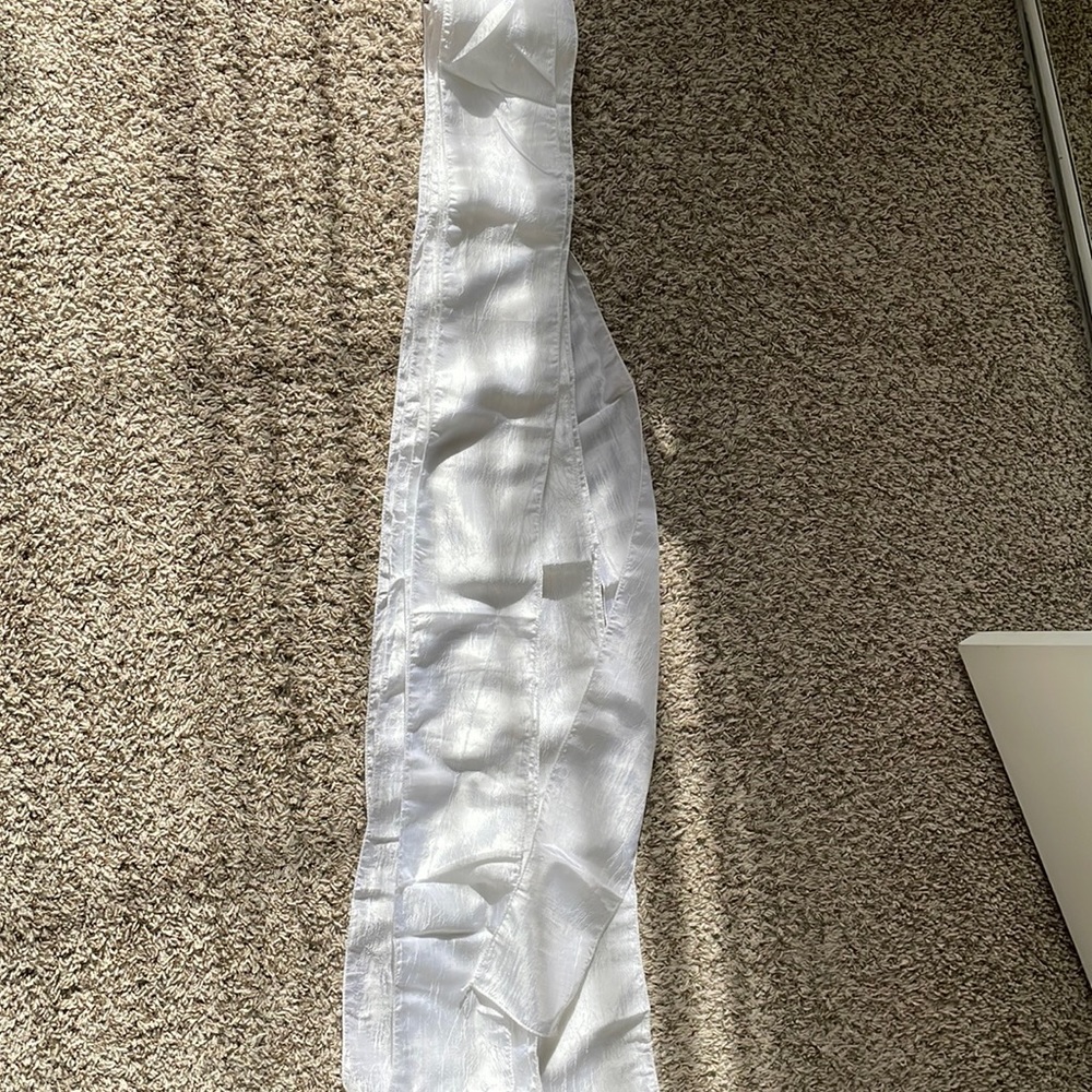 Long white sashes